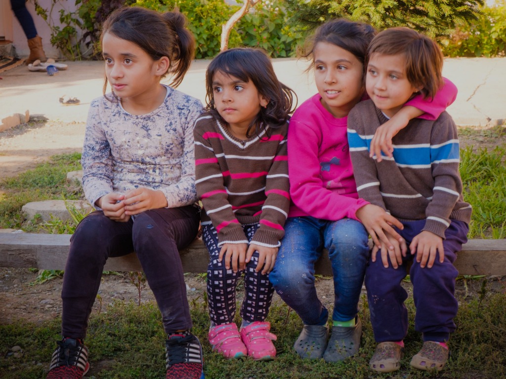 Children sitting listening