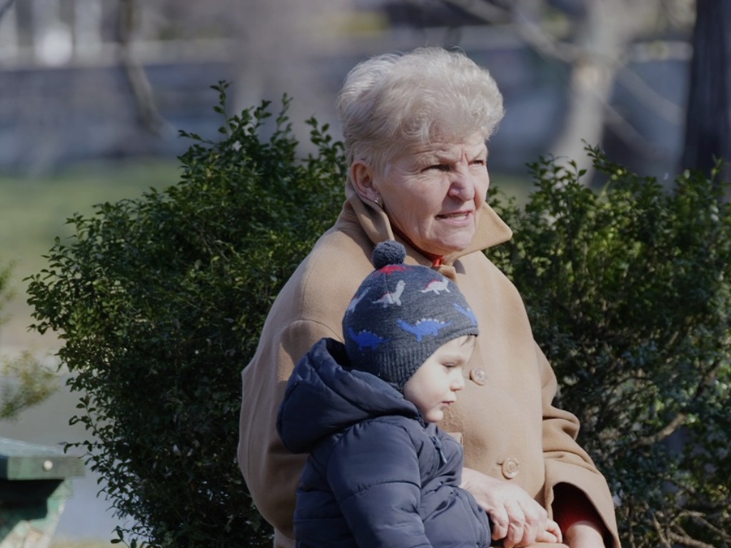 Grandma sitting with a child (image from Pixabay.com)