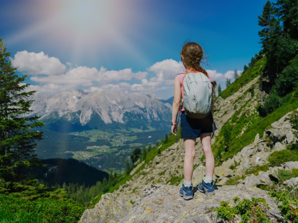 Child standing on a mountain