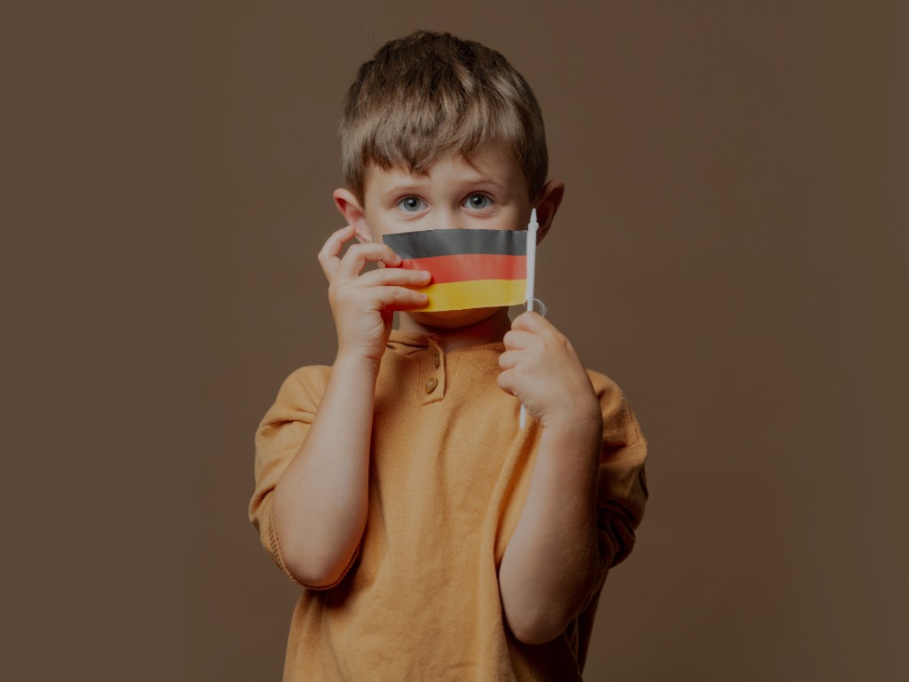 child holding a German flag